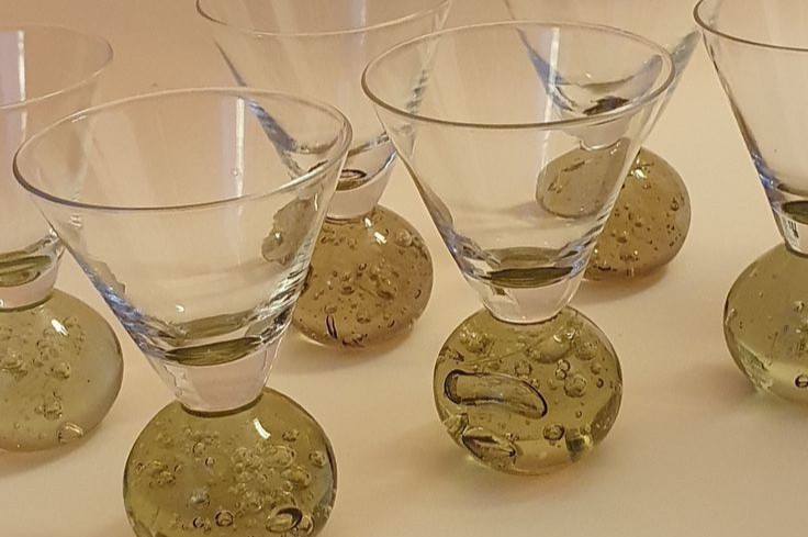 Vintage hand-blown cocktail glasses with bubbles in glass